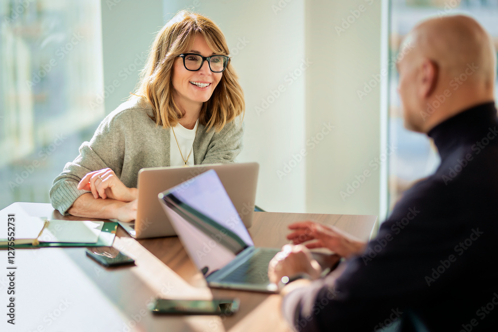 Group of business people sitting on business meeting in a modern office Group of business people sitting on business meeting in a modern office