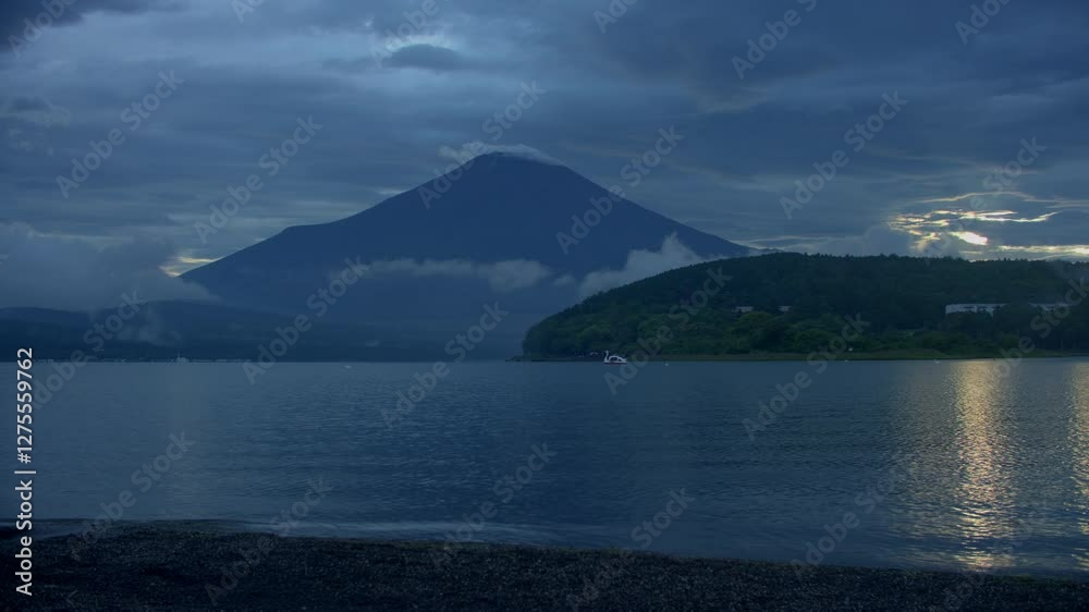Mount Fuji’s Reflection on Yamanakako at Twilight – A mesmerizing view of Japan’s iconic peak mirrored in the still waters of Yamanakako Lake Mount Fuji’s Reflection on Yamanakako at Twilight – A mesmerizing view of Japan’s iconic peak mirrored in the still waters of Yamanakako Lake