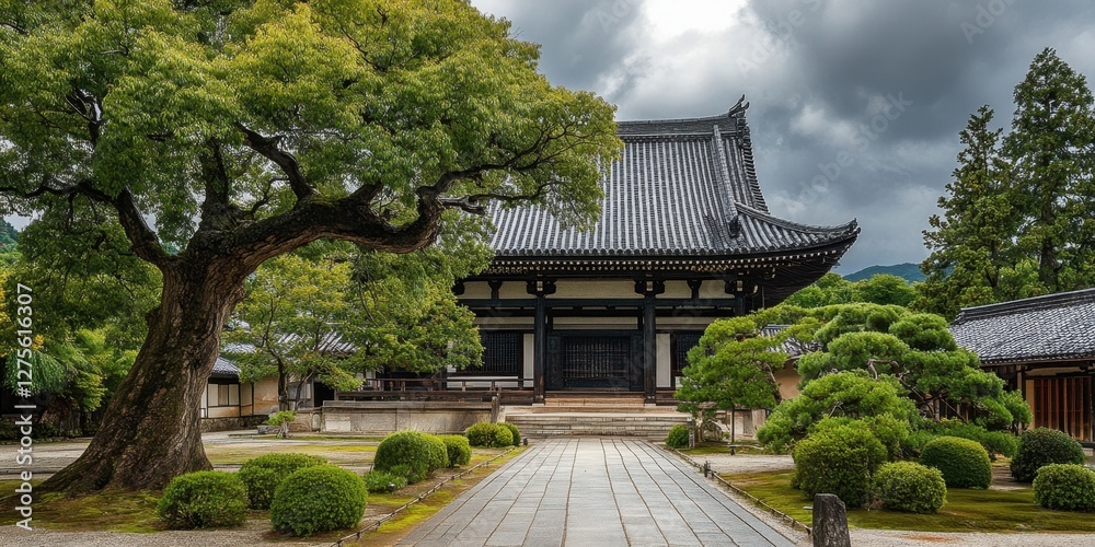 Historic Japanese architecture framed by lush green landscaping and an expansive Ombu tree under a dramatic gray sky, highlighting timeless beauty and serenity. Historic Japanese architecture framed by lush green landscaping and an expansive Ombu tree under a dramatic gray sky, highlighting timeless beauty and serenity.