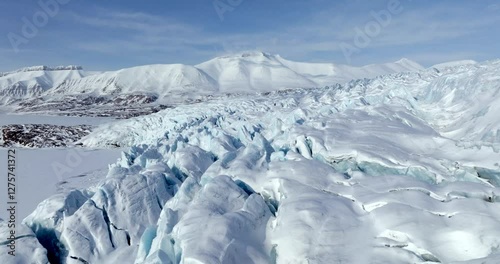 Arctic circle endless glaciers on a clear day, Aerial view