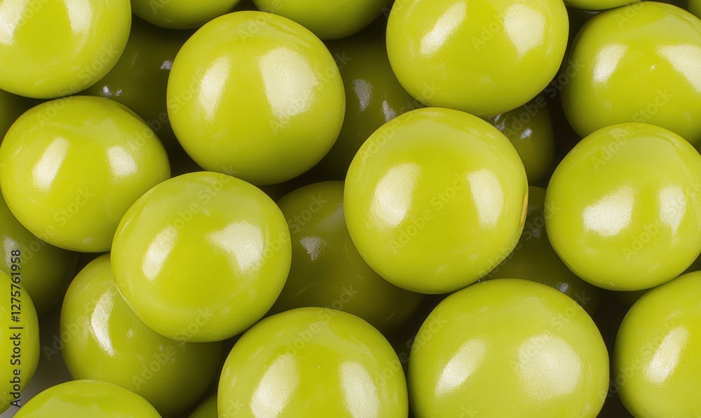 Close-up of glossy green spheres clustered together, creating a vibrant texture and color Close-up of glossy green spheres clustered together, creating a vibrant texture and color