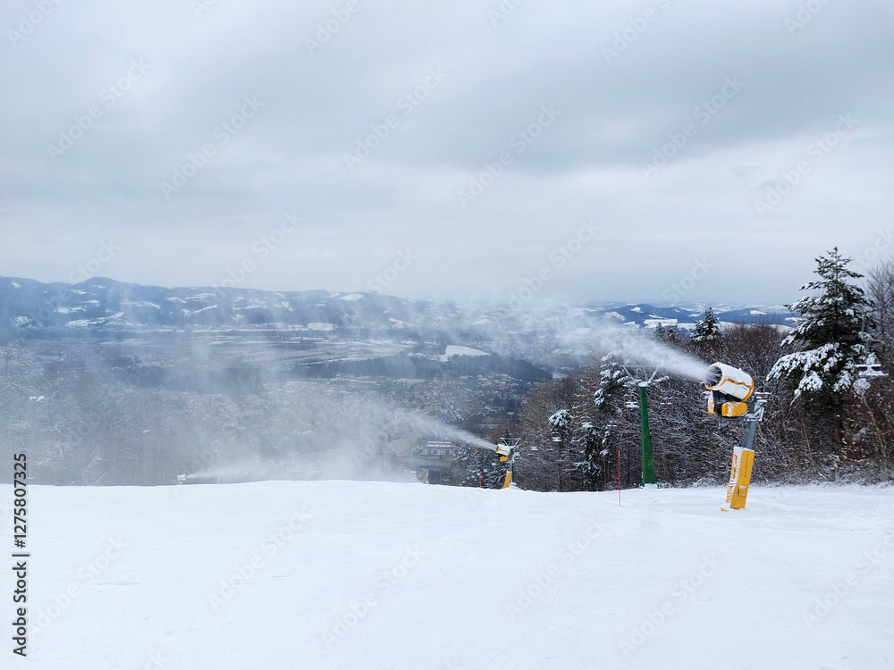 Production of snow on ski trail. Snow cannons. Mariborsko Pohorje under snow. Slovenia. Europe