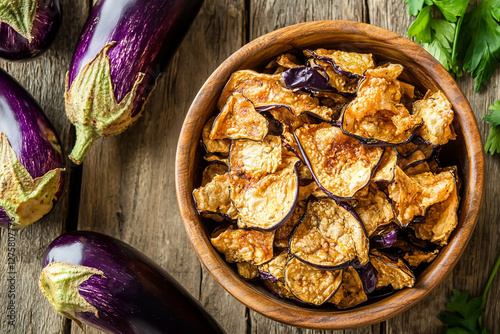 Crispy eggplant chips in a wooden bowl. Generative AI