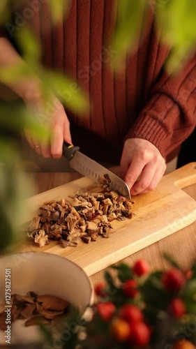Woman Chopping Brown Mushrooms into Small Pieces