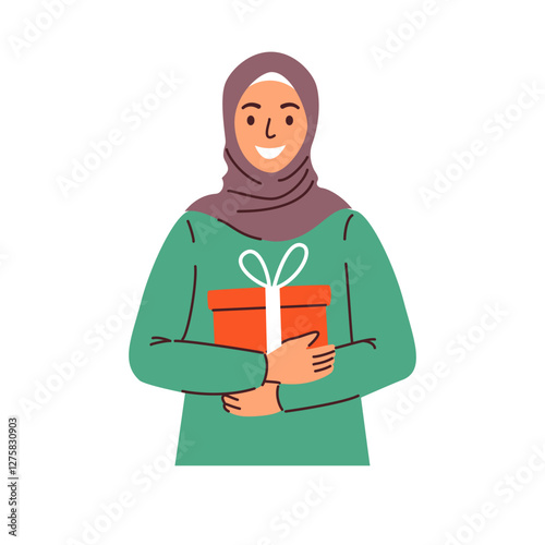 A smiling woman in a hijab carefully holds a gift