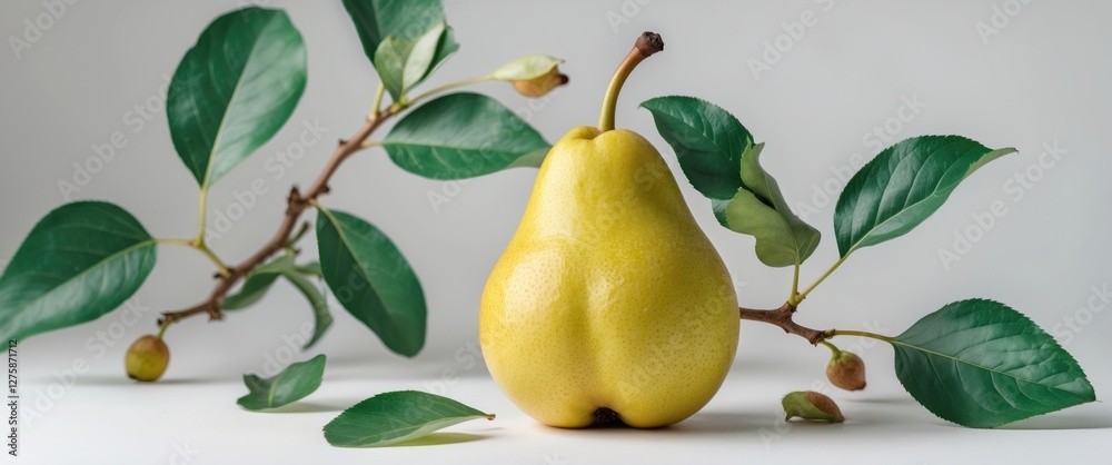Obraz premium Ripe Yellow Pear Surrounded By Fresh Green Leaves On A Clean White Background