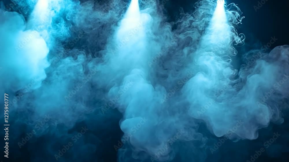 Blue smoke clouds lit by spotlights in a dark room