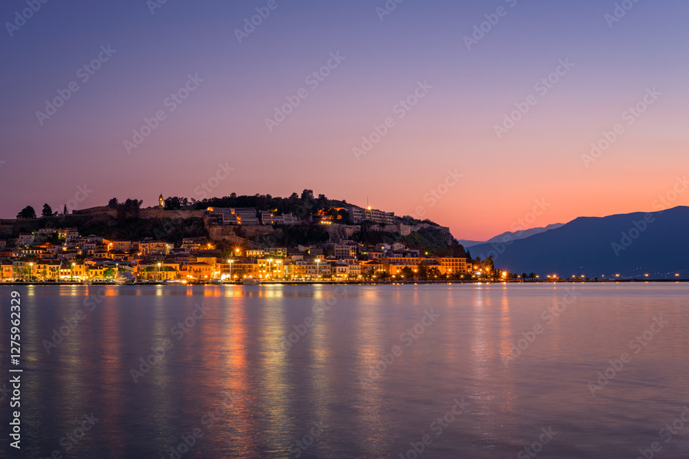 Nafplion Cityscape at Sunset with Reflections on the Water Nafplion Cityscape at Sunset with Reflections on the Water