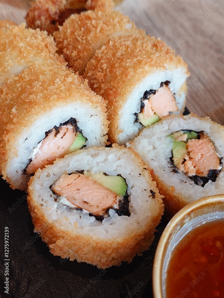Enjoy these delicious, crispy sushi rolls filled with salmon and creamy avocado