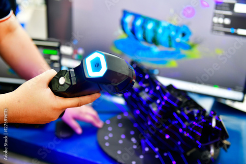 Portable 3D Auto parts handheld scanner is scanning to measure size and texture for future product development production in the automotive industry