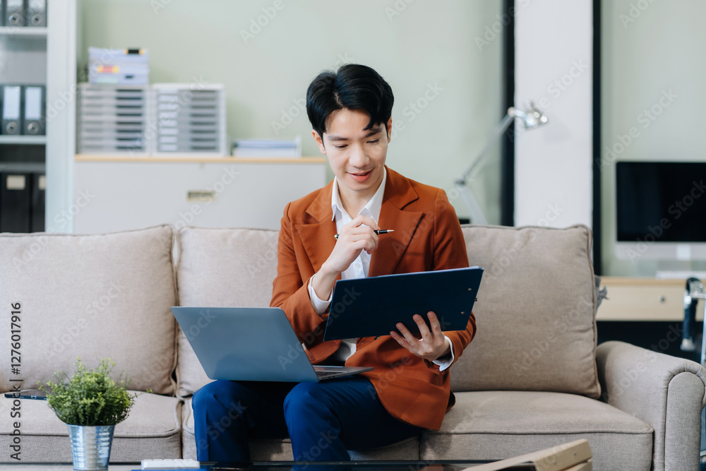 Business man working at office with laptop and documents on desk. Business man working at office with laptop and documents on desk.