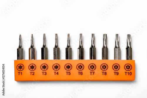 Set of phillips and flathead magnetic precision screwdriver bits on white background