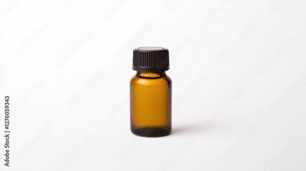 Fototapeta premium Small amber bottle with black cap, perfect for essential oils