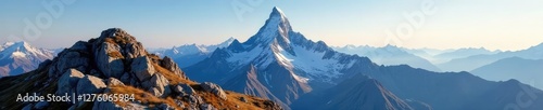 Peak of the mountain with a small space in front, rocky outcrop, mountain peak