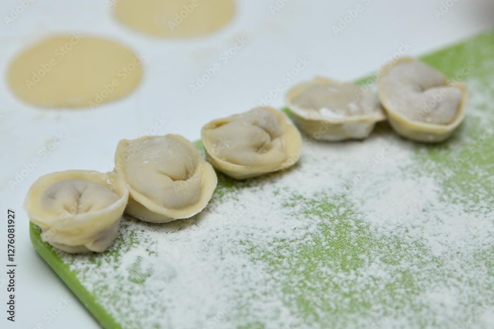 Making Russian dumplings with meat Making Russian dumplings with meat