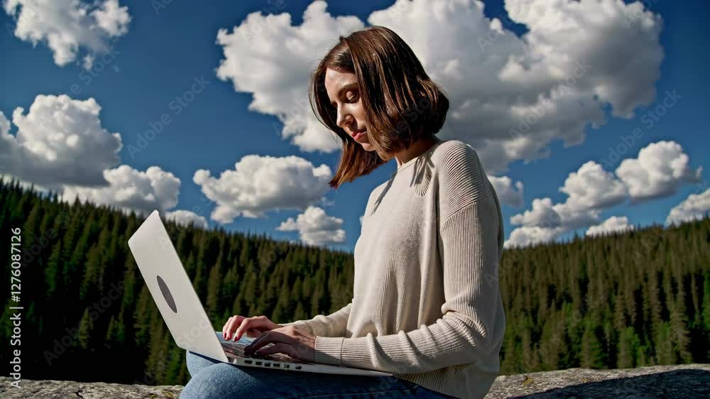 A digital nomad working with a breathtaking view