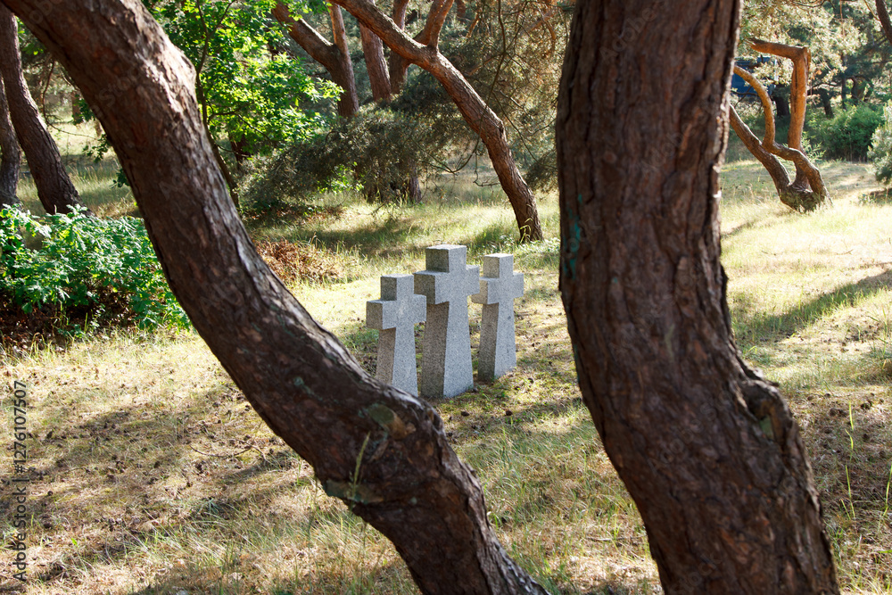 three stone crosses in the old cemetery