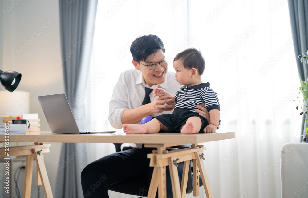 Father enjoys playful moment with toddler at home office during morning hours Father enjoys playful moment with toddler at home office during morning hours