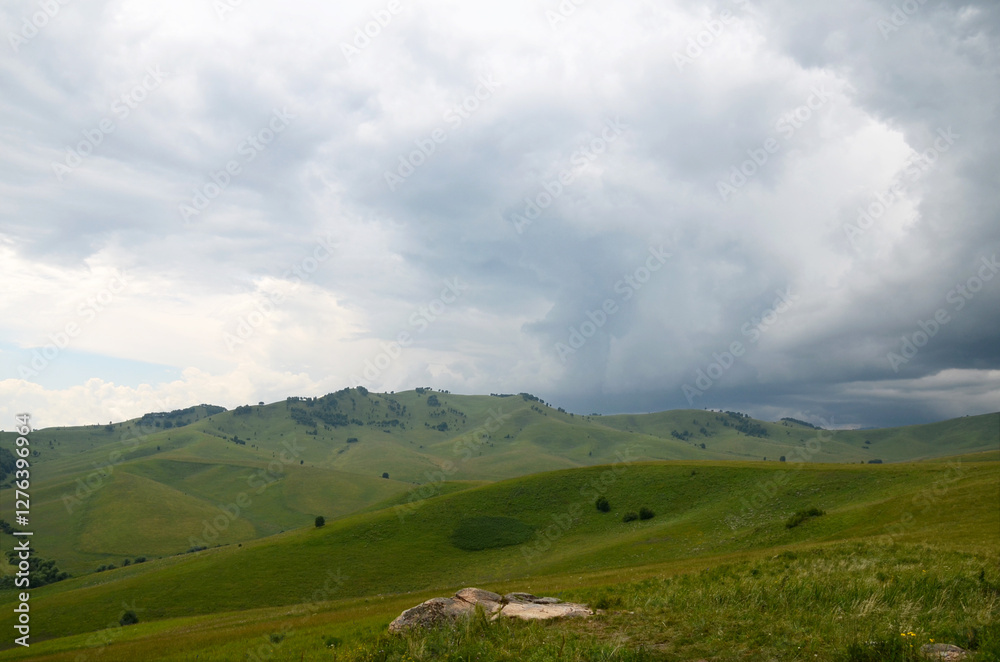Fototapeta premium Green hills and mountains, panoramic view of mountains, before rain