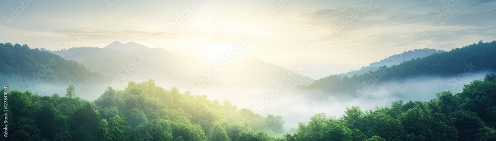 Fototapeta premium A breathtaking landscape showcasing a tranquil morning with mist gently rising over lush green hills, illuminated by the soft rays of a rising sun, evoking peace and serenity.