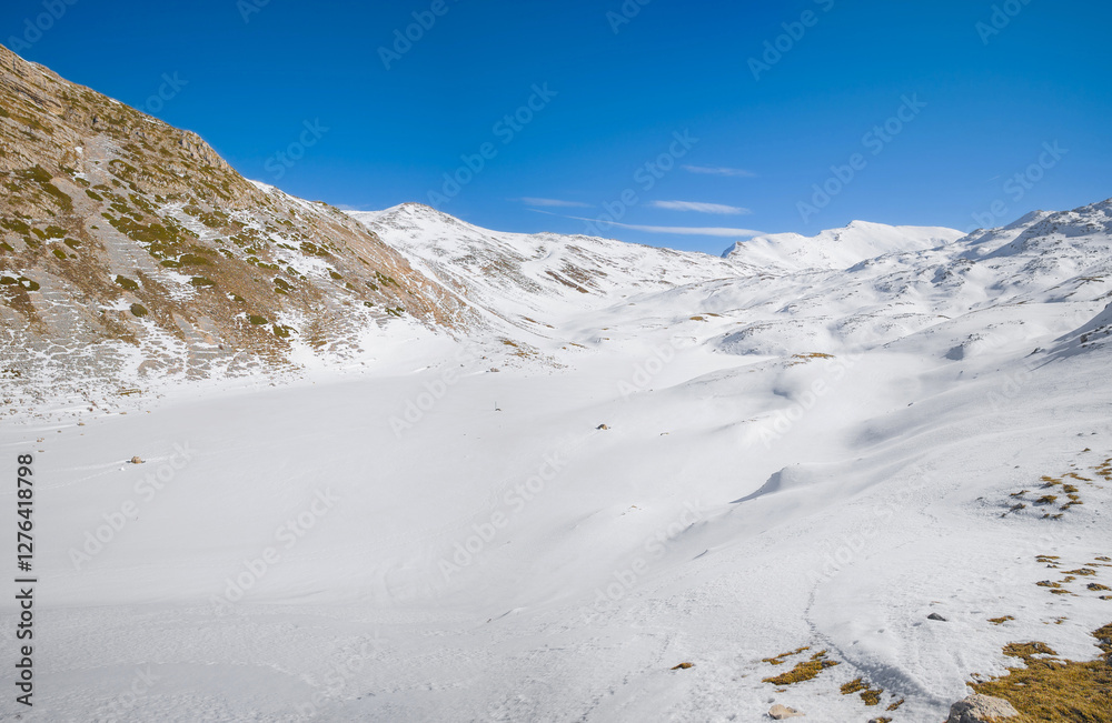 Duchessa lake and Sirente Velino park (Italy) - In the natural park of Sirente Velino, the landscape with snow of Duchessa lake, Lazio and Abruzzo regions.