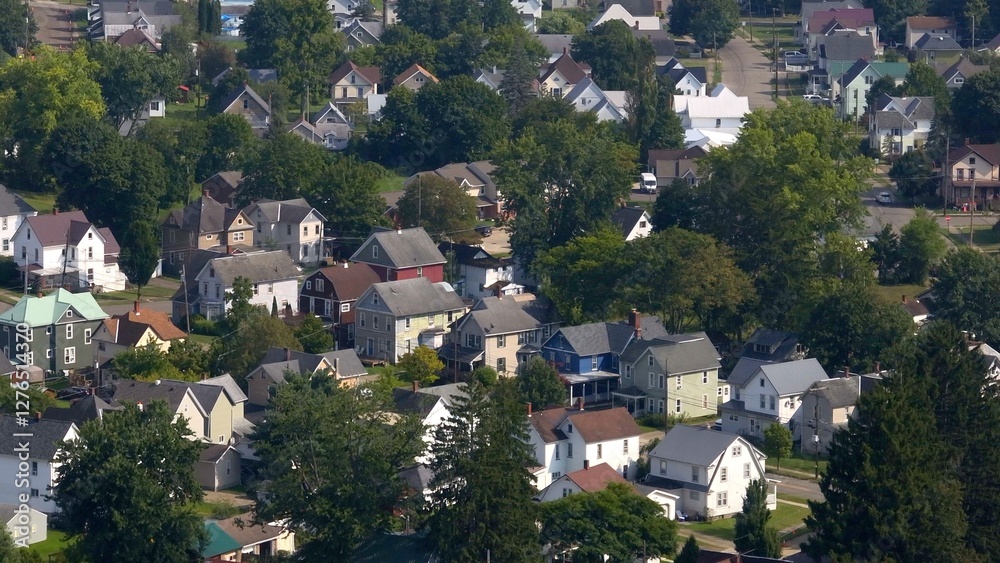 Fototapeta premium Good Living in urban neighborhood homes in Warren, Pennsylvania with historic architecture near Allegheny National Forest and Allegheny river used for boating and fishing 