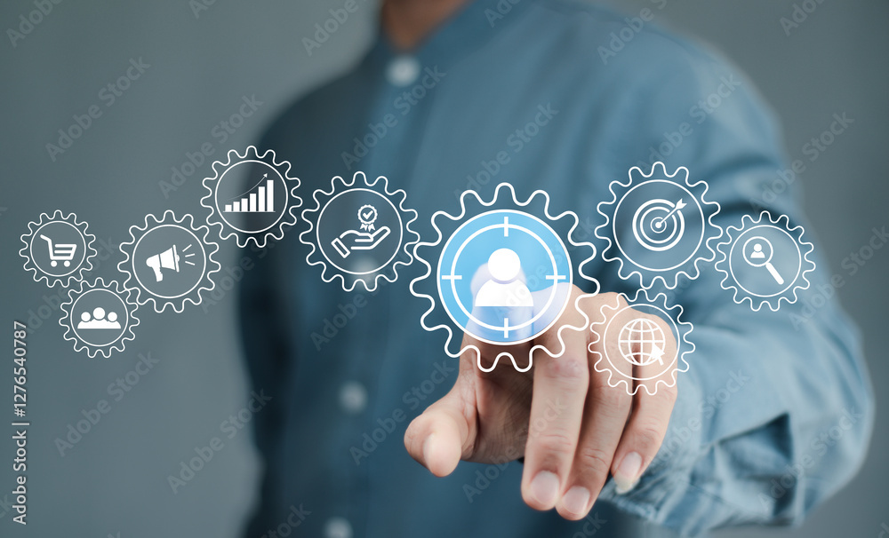 Digital marketing strategy and customer targeting concept. A person interacts with interface marketing and customer target icons, symbolizing strategic planning, audience engagement, business growth, Digital marketing strategy and customer targeting concept. A person interacts with interface marketing and customer target icons, symbolizing strategic planning, audience engagement, business growth,