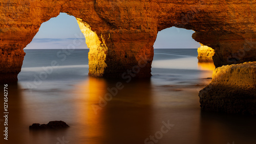Marinha beach (Praia da Marinha) beaches in Portugal's Algarve region. The rocky Atlantic coast at sunrise, in the golden hour.