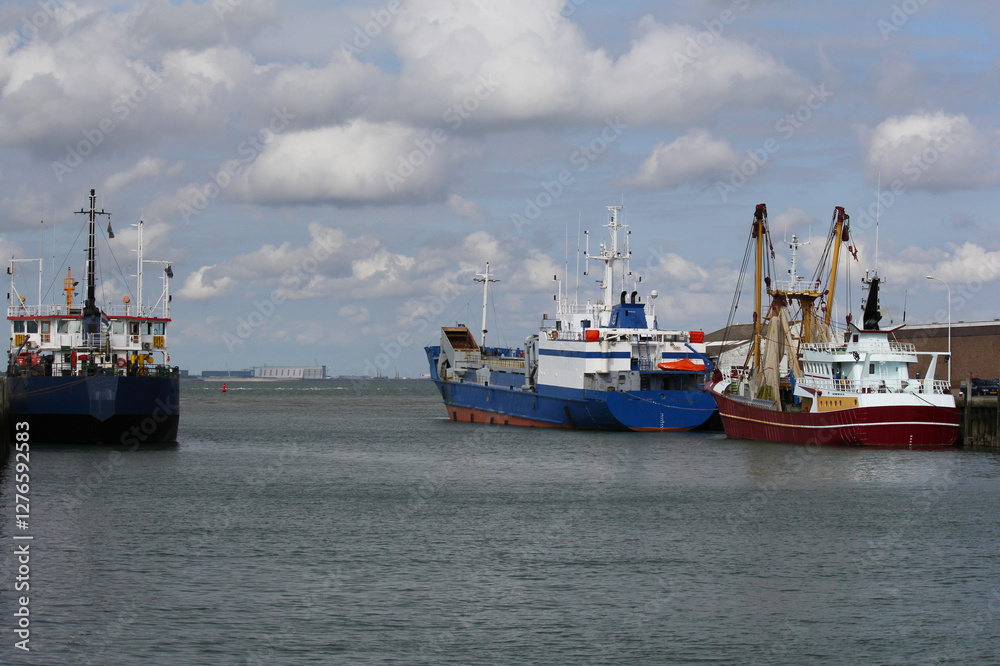 the fishing port of Breskens with large fishing boats at the dutch coast in zeeland the fishing port of Breskens with large fishing boats at the dutch coast in zeeland