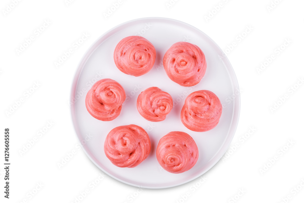 Steamed buns in the form of roses in a plate on a white isolated background Steamed buns in the form of roses in a plate on a white isolated background