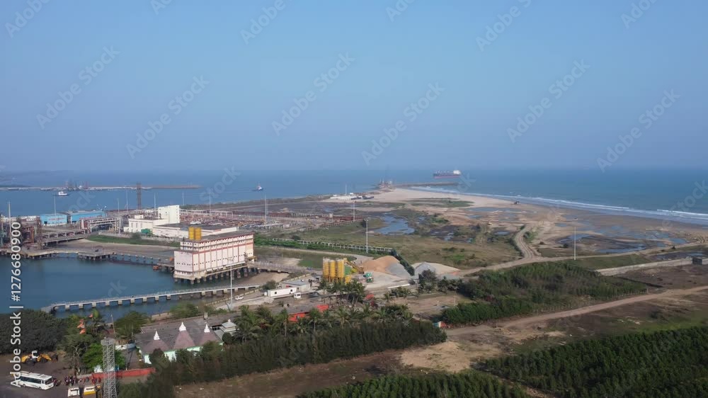 Aerial view of the bustling Port of india with colorful shipping containers, cranes, and cargo ships. Port cranes. Aerial view of the bustling Port of india with colorful shipping containers, cranes, and cargo ships. Port cranes.