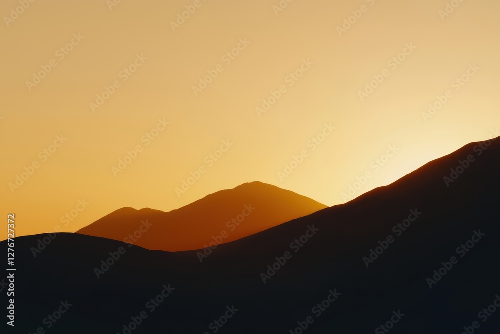 Obraz premium Misty mountain landscape at sunrise, golden light over the peaks, peaceful and breathtaking nature scenery, cinematic and ultra-HD quality