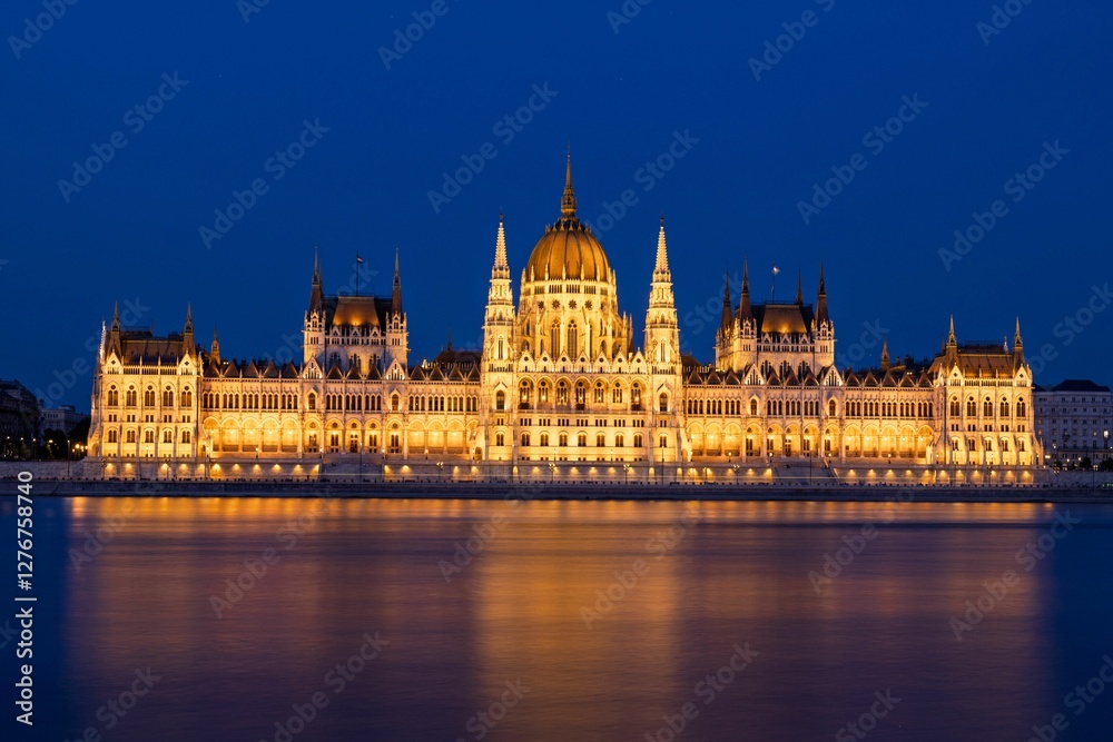 Hungarian Parliament at night with river reflection. Hungarian Parliament at night with river reflection.