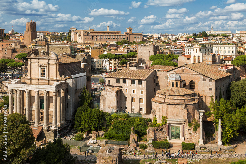 Top view of the Roman Forum with ruins of ancient Roman monuments on a sunny summer day, Rome, Italy Top view of the Roman Forum with ruins of ancient Roman monuments on a sunny summer day, Rome, Italy