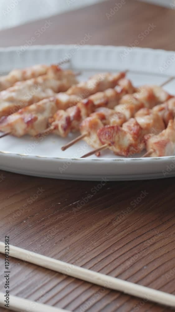 Grilled chicken Meat On Yakitori Style Meal In Izakaya. Japanese Food Grilled chicken Meat On Yakitori Style Meal In Izakaya. Japanese Food
