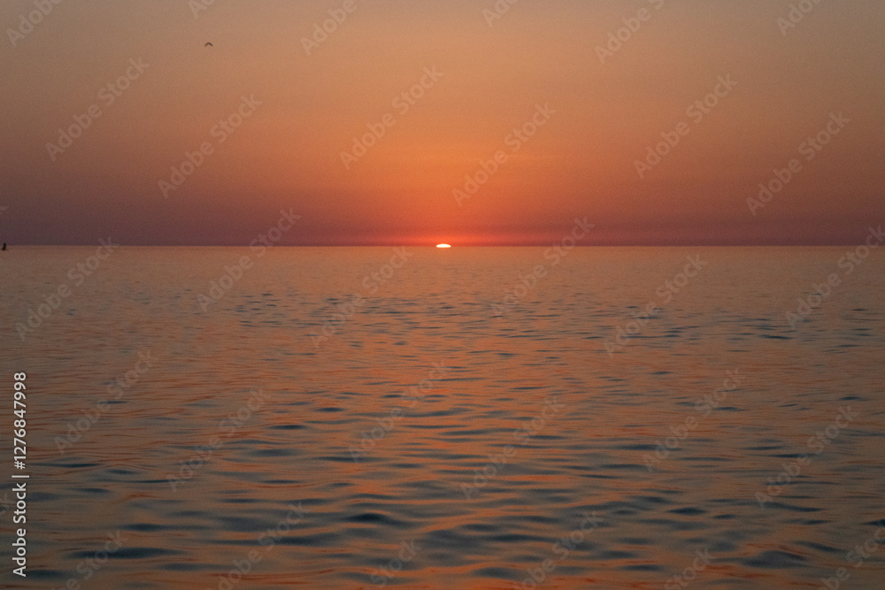 sunset on the background of the sea sky, Sunset sky, clouds over the sea in the evening with orange, yellow sunlight, Golden hour sunset on the background of the sea sky, Sunset sky, clouds over the sea in the evening with orange, yellow sunlight, Golden hour