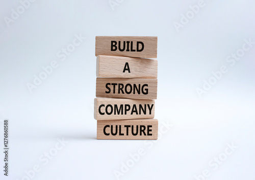 Company culture symbol. Wooden blocks with words Build a strong company culture. Beautiful white background. Business and Company culture concept. Copy space.