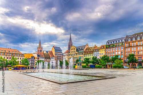 Place Kleber square in old town Strasbourg city historic centre with old houses colorful medieval buildings, fountain and Statue of Jean-Baptiste Kleber in Centre, Alsace Grand Est region, France photo