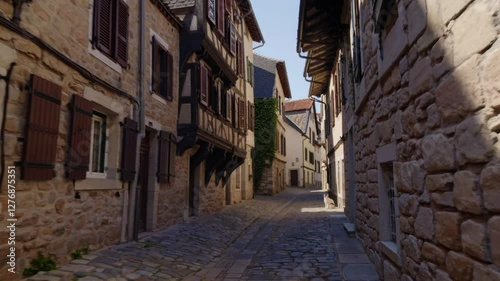 Slow Motion Small Street Between Old Houses in a Medieval Village – Narrow Cobblestone Pathway, Historic European Architecture, Charming Rustic Atmosphere, Ancient Stone Walls, Tranquil Timeless 