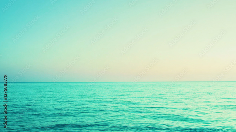 Naklejka premium Serene turquoise and lime green gradient over calm water at dusk