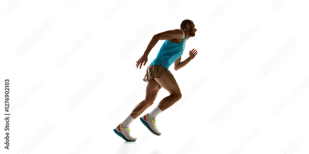 Runner accelerating forward, dynamic posture and strong physique emphasizing movement against white studio background. Concept of sport, speed, competition, and athletic performance. Runner accelerating forward, dynamic posture and strong physique emphasizing movement against white studio background. Concept of sport, speed, competition, and athletic performance.