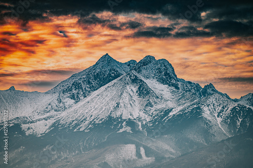 Fototapeta Naklejka Na Ścianę i Meble -  Massive Tatra Mountains in late winter. View from the valley.
