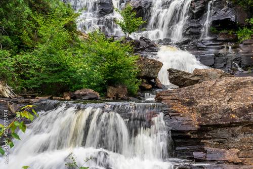 rocky waterfall, rushing streams of water