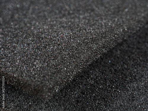 Polyurethane foam material for noise insulation and packaging, efficient and lightweight, ideal for sound protection.