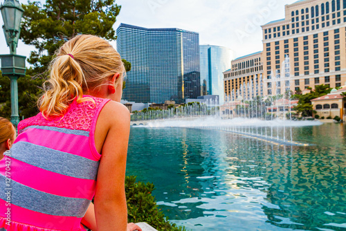 Young Girl Watching  the Fountains on Las Vegas Boulevard, Las Vegas, Nevada, USA