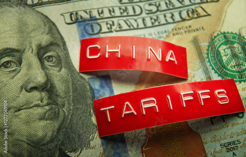 China and Tariff labels on a US hundred dollar bill