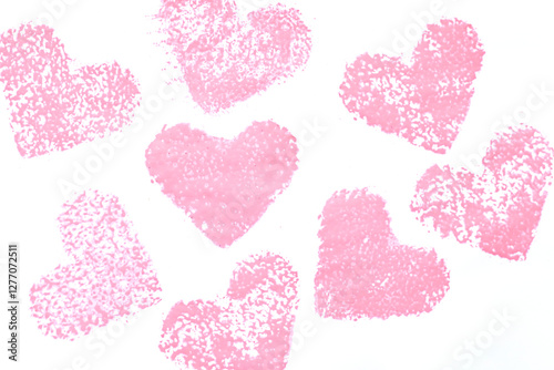 Abstract pink hearts on a white background with textured design elements