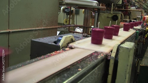conveyor belt moving candle in production