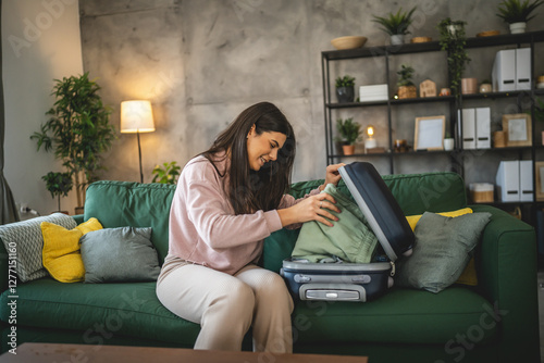 One woman pack suitcase baggage prepare for vacation holiday