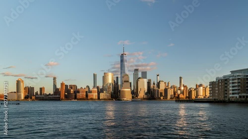 Sunset time lapse of Lower Manhattan skyline from Hudson Riverside in winter